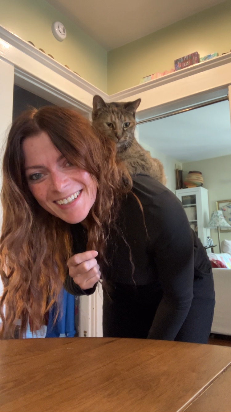 Dana with a cat client in Vancouver
